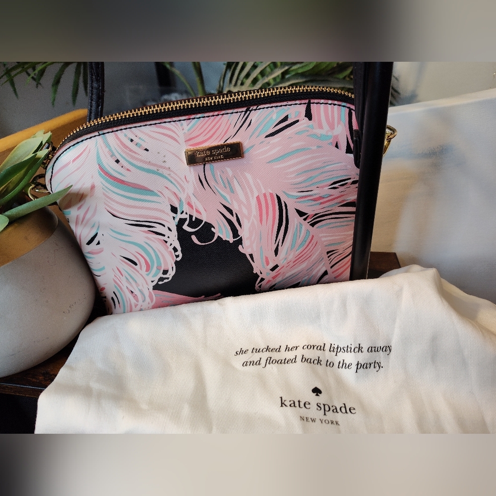 Kate Spade Bright waterHanna with dust bag. Like new condition Aprox Size